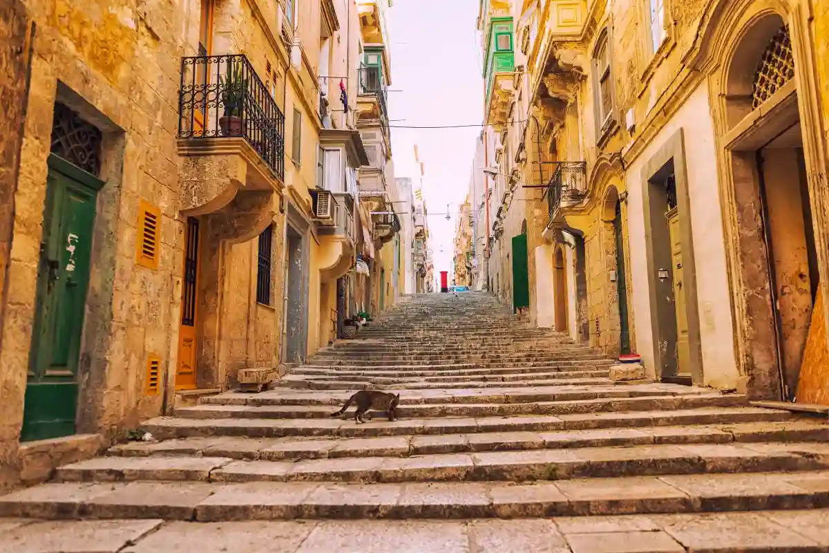 Staircase in a historic street in Valletta, Malta – a typical example of pedestrian infrastructure with multiple steps, making access difficult for strollers and wheelchair users.