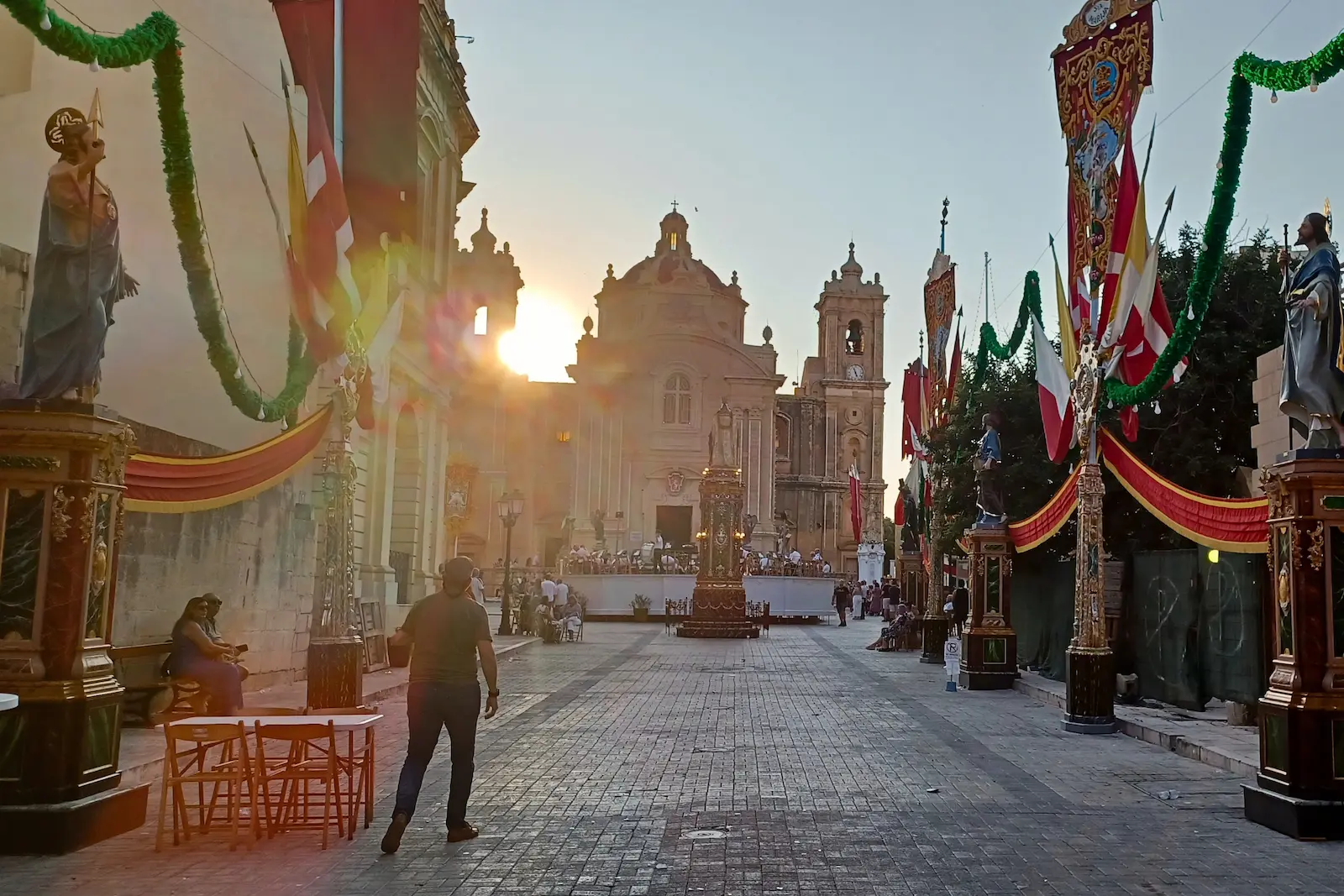 Street decorations and the church in Qrendi during the Santa Marija celebrations in Malta, shortly before the evening events begin.